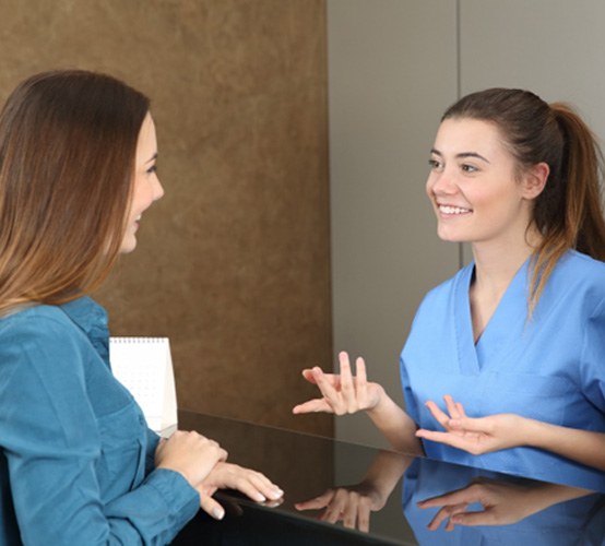 Patient talking to a dentist