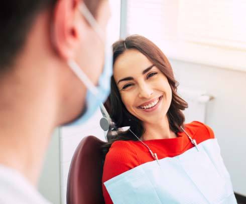 woman smiling in dental office chair