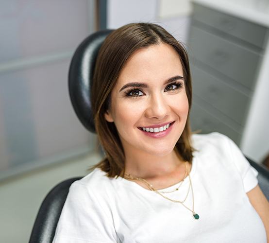 Woman at preventive dentistry visit smiling during dental checkups