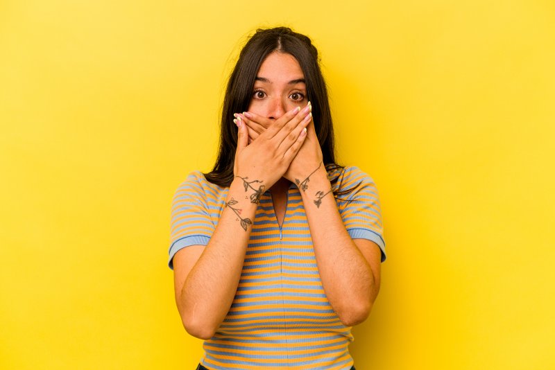 Woman worried about her teeth shifting