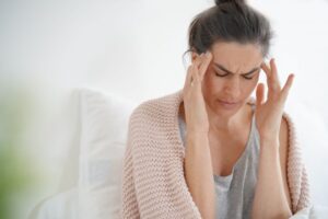 Woman with headache.